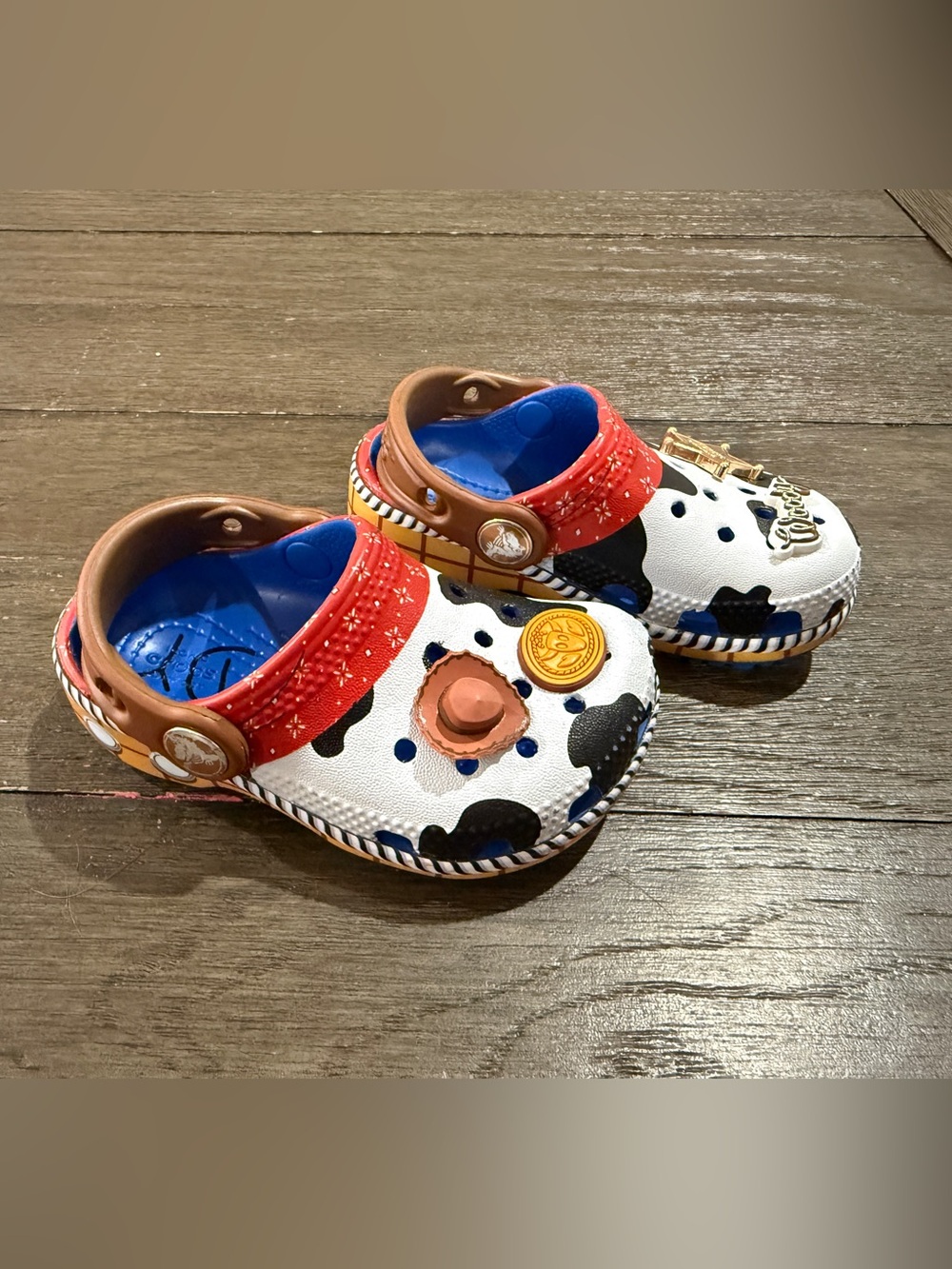 CROCS Kids Toy Story Woody Cow-Print Clog Sandals with Red and Blue Accents